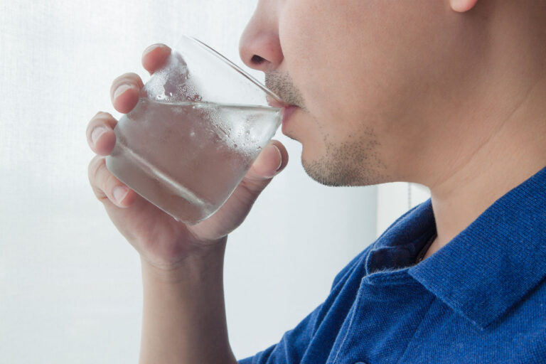 man-drinking-water