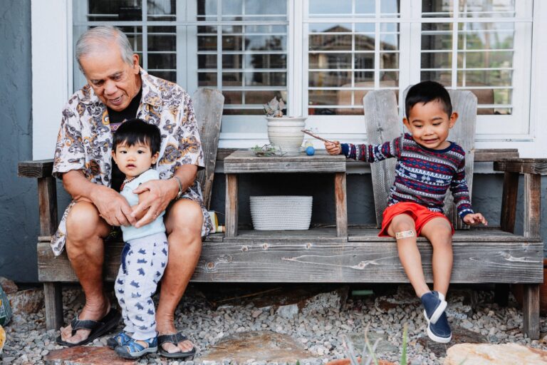 a-grandpa-and-his-two-grandsons-enjoying-a-nice-summer-day-outdoors